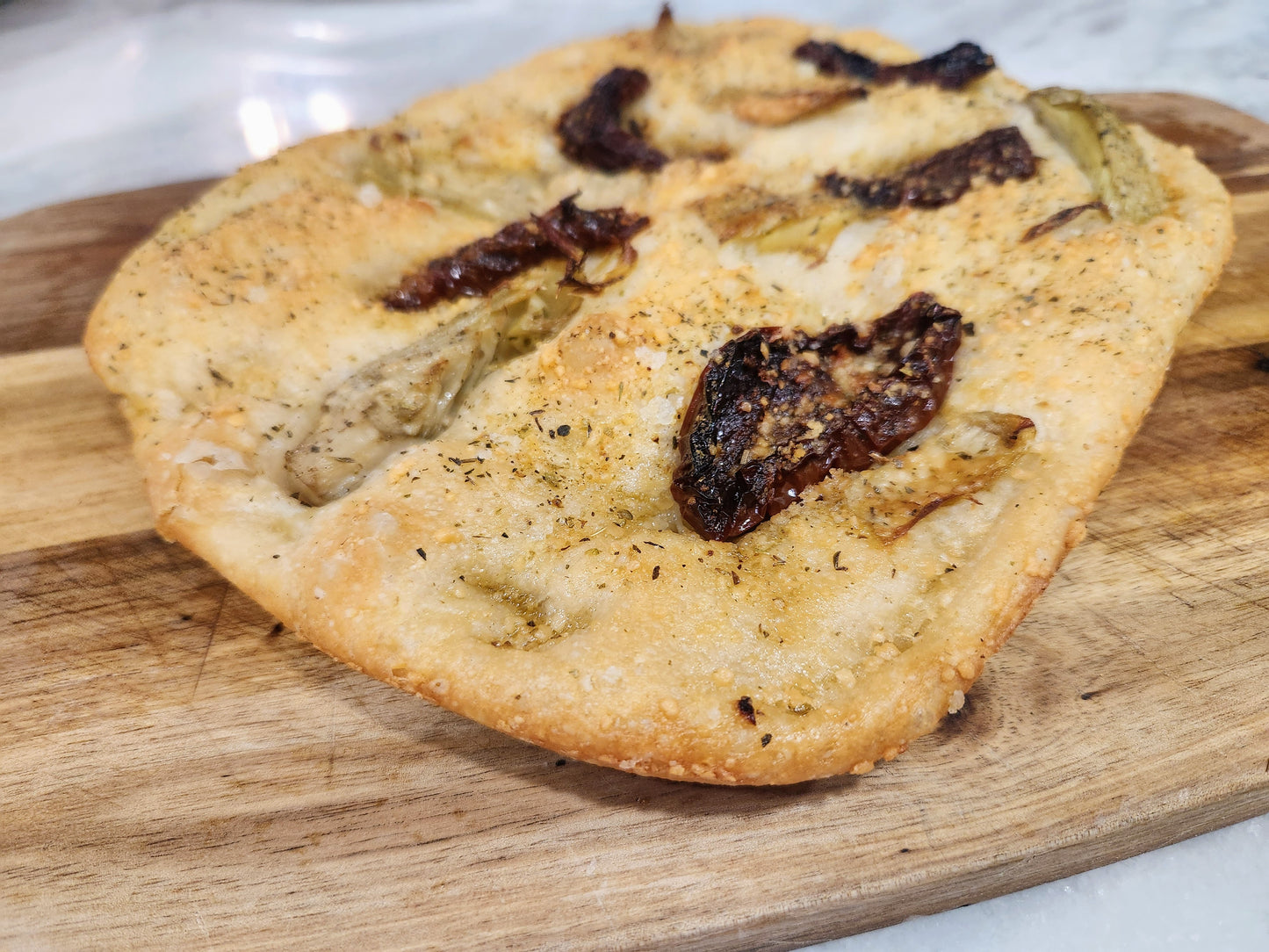 **New Item** Parmesan Foccacia Bread with Sun-dried Tomatos and Artichoke