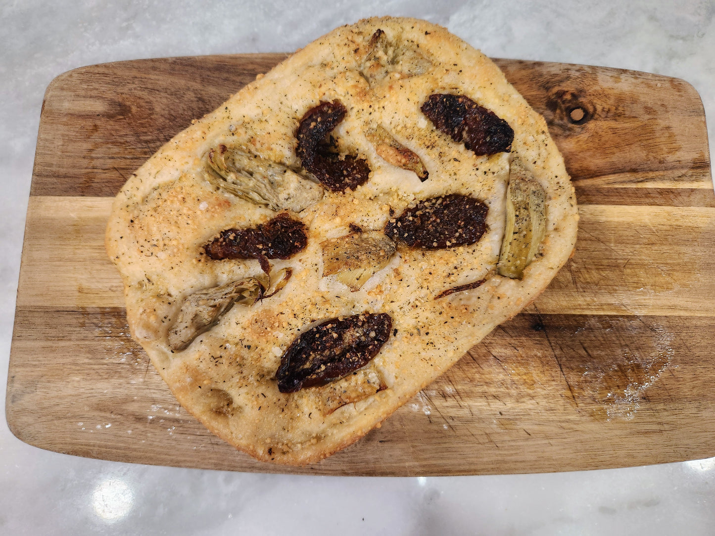 **New Item** Parmesan Foccacia Bread with Sun-dried Tomatos and Artichoke